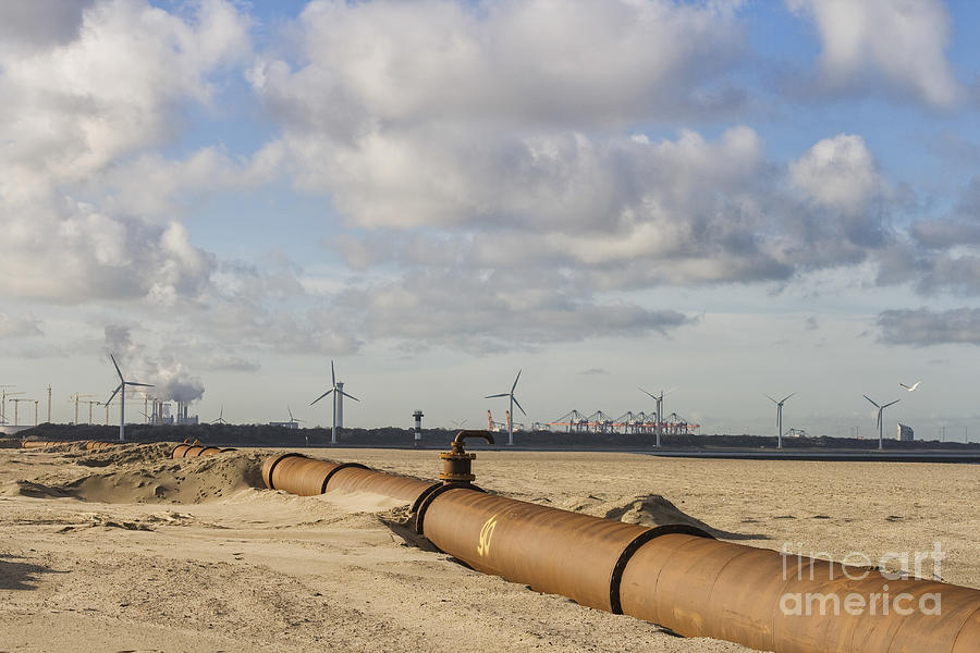 Pipelines on beach near port of Rotterdam Photograph by Patricia Hofmeester