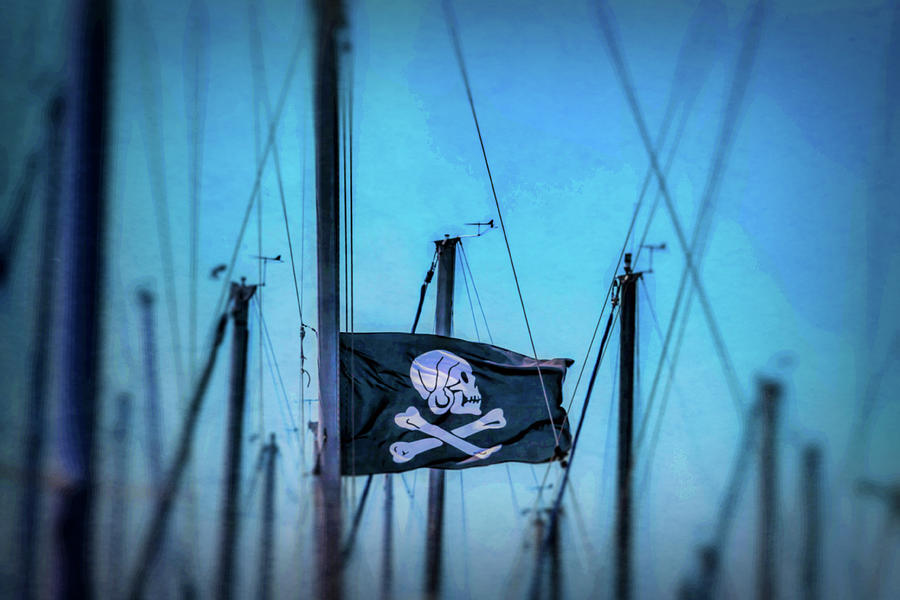 Pirate Flag Among Masts Photograph by Garry Gay