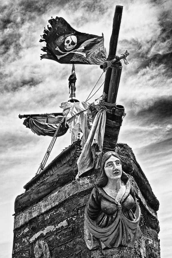 Pirate ship and black flag Photograph by Garry Gay