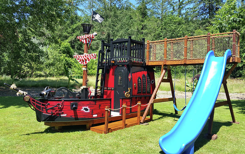 outdoor wooden pirate ship playhouse