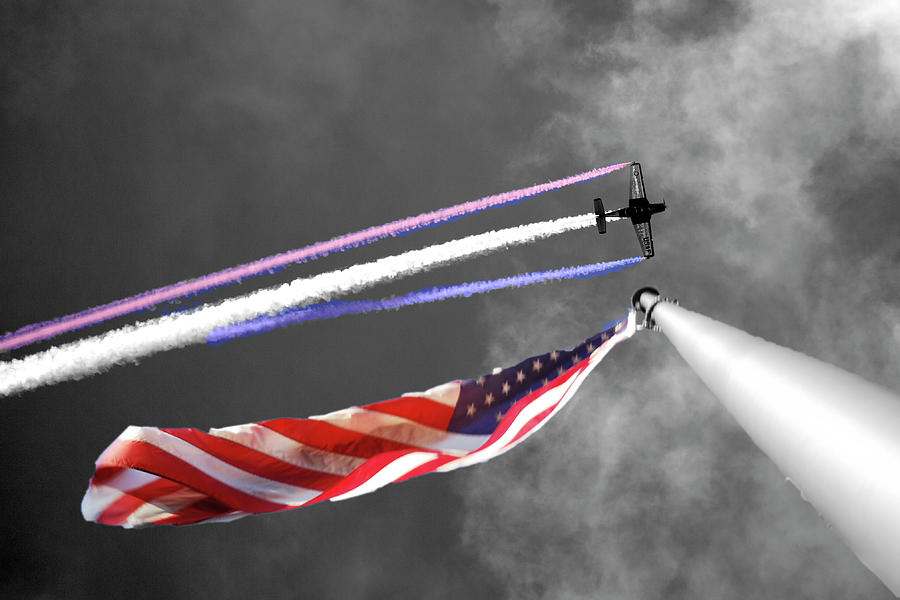 Plane Over Flag Photograph by Michael Riley