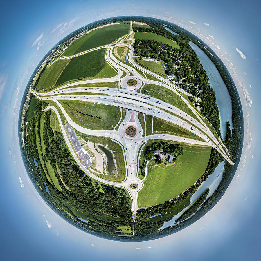 Planet of the Roundabouts Photograph by Randy Scherkenbach