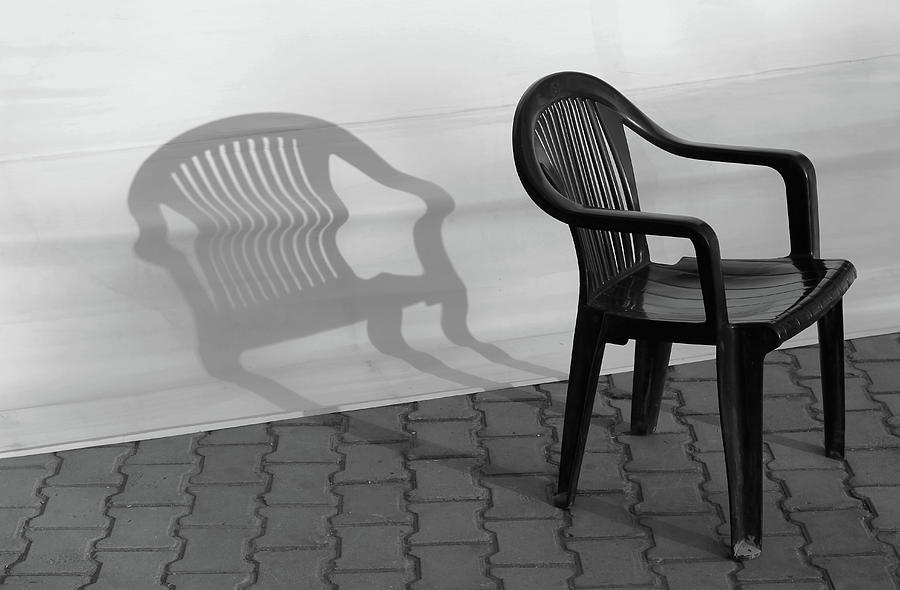 Plastic Chair Shadow 1 Photograph by Prakash Ghai