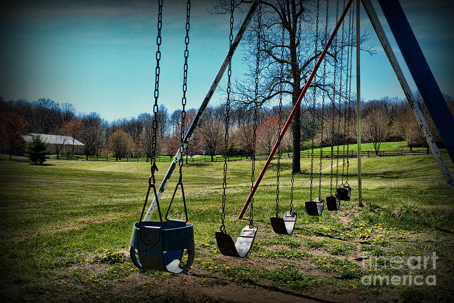 Playground Swing Photograph by Paul Ward
