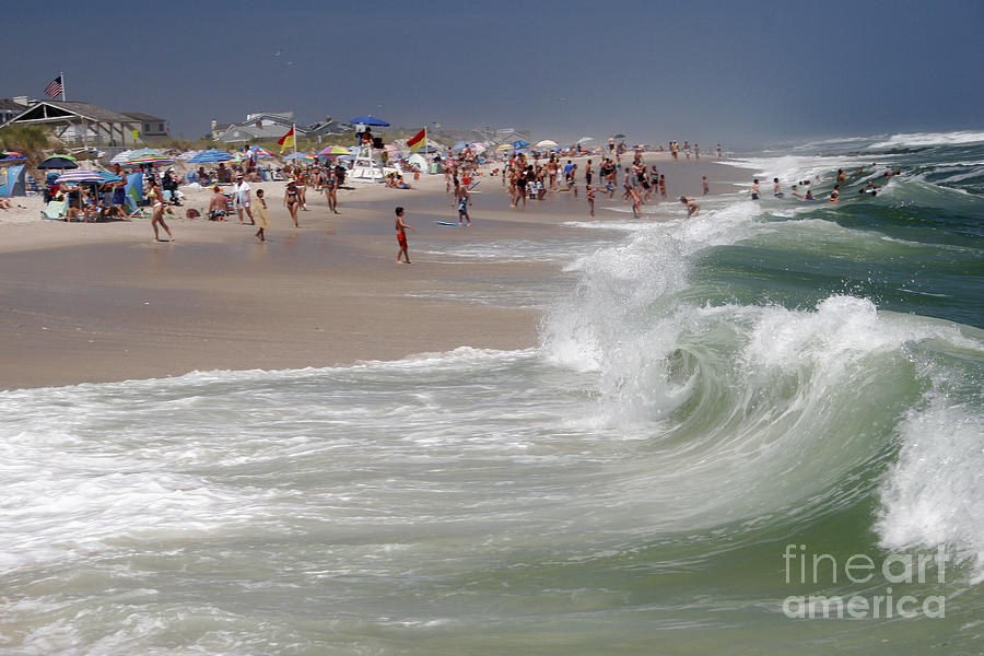 Beach Photograph - Playing in the Waves by Kelly S Andrews