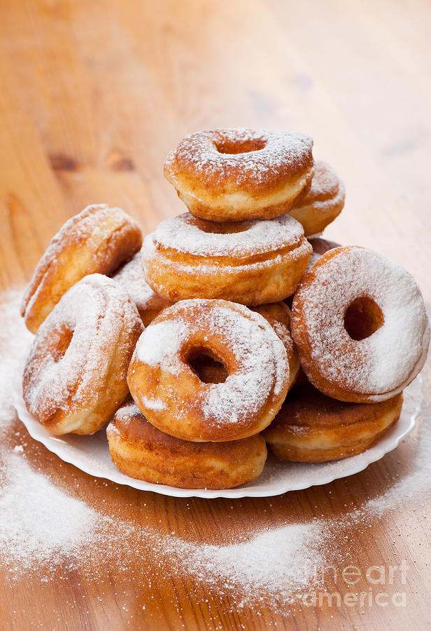 Donut Photograph - Plenty doughnuts or donuts with holes  by Arletta Cwalina