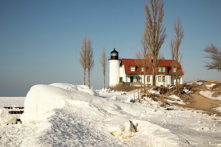 Point Betsie Lighthouse, Lake Michigan in winter Photograph by Karen Foley