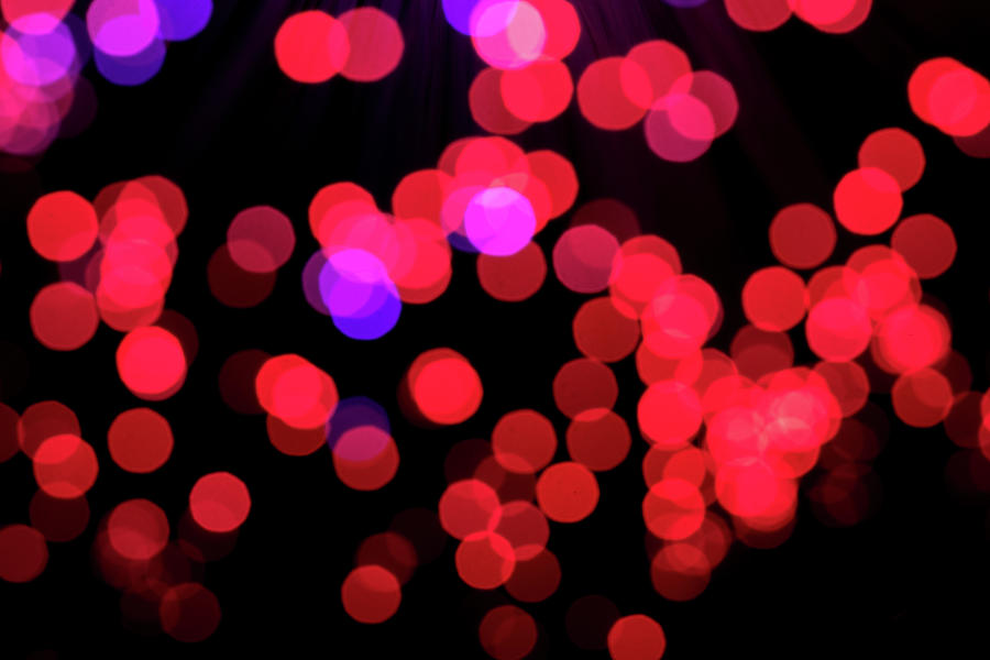 Points of Red Bokeh lights Photograph by Roy Pedersen