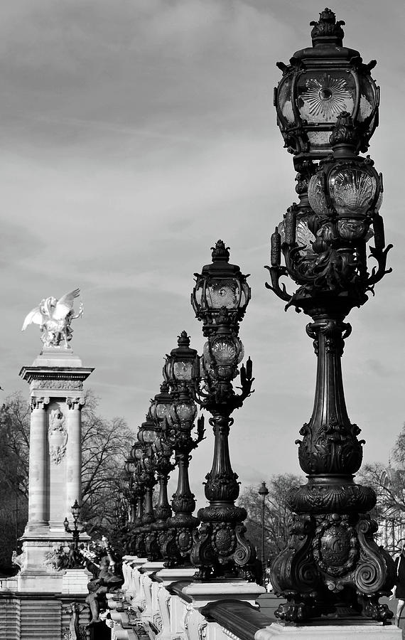 Pont Alexandre III Bridge Lamp Posts and Gilded Column Pegasus Paris France Black and White Photograph by Shawn OBrien