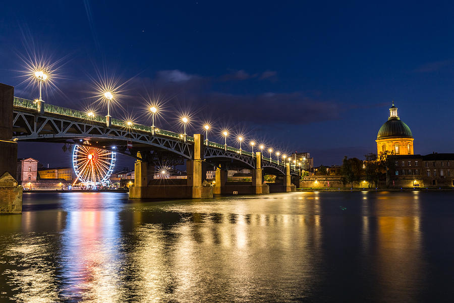 Pont Saint-PIerre with street lanterns at night Photograph by Semmick Photo