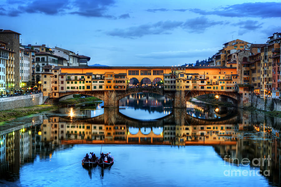 Ponte Vecchio bridge in Florence, Italy. Arno River at night Photograph by Michal Bednarek