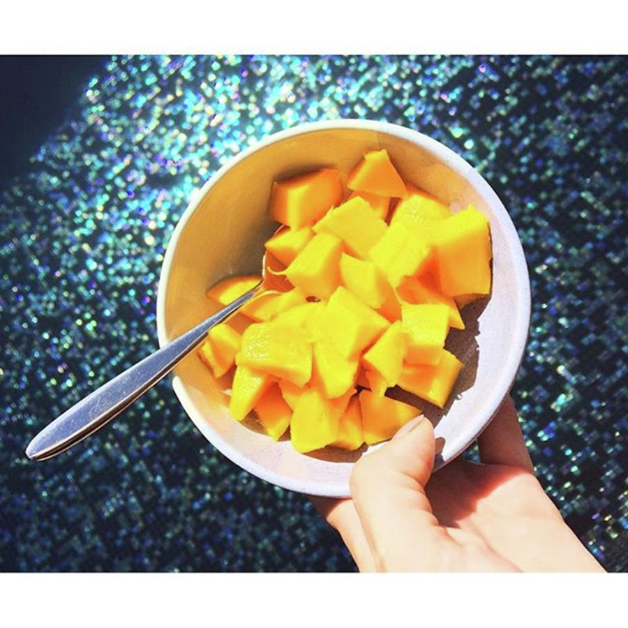 Pooltime Snack Of The Day: Mango Photograph by Nienke Van der Meij