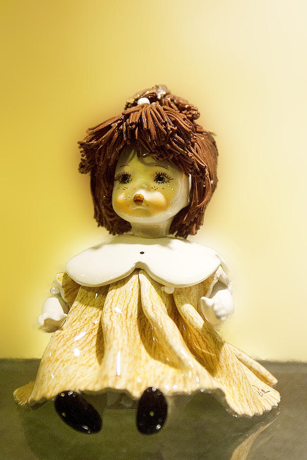 Porcelain Doll in Yellow Photograph by Linda Phelps