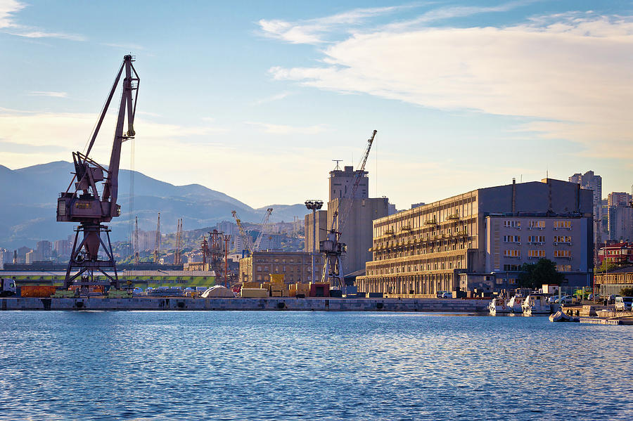 Port city of Rijeka cranes and industrial zone in harbor view Photograph by Brch Photography