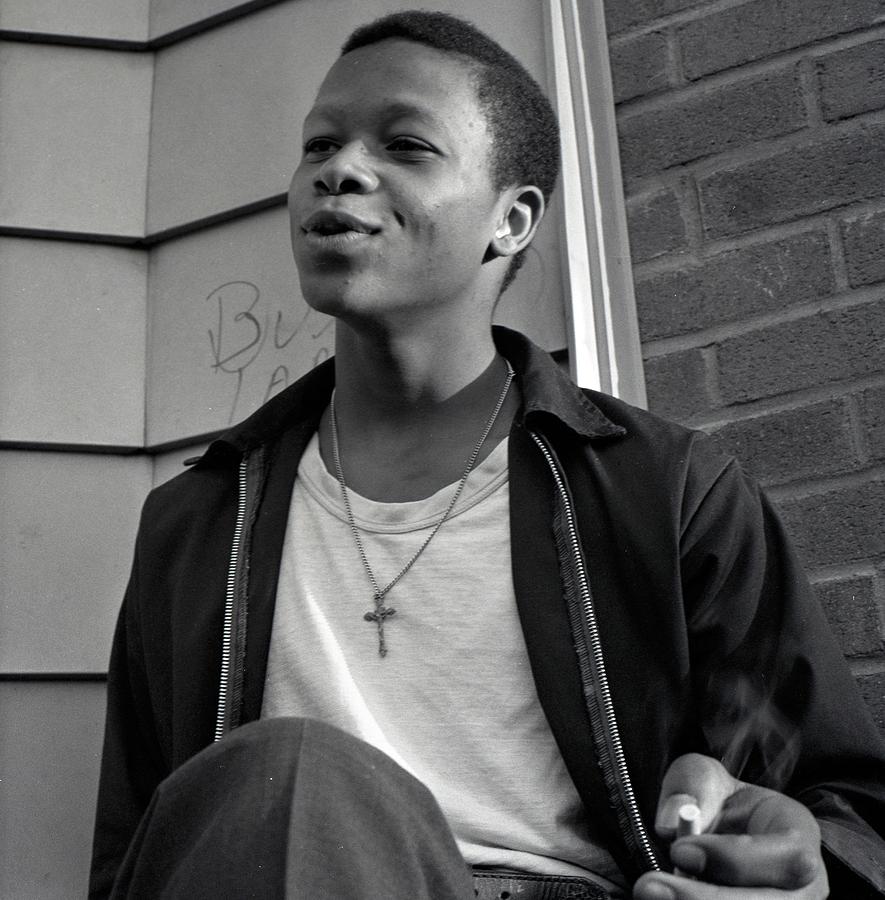 Portrait of a smoking teen Photograph by Ronald Watkins - Fine Art America