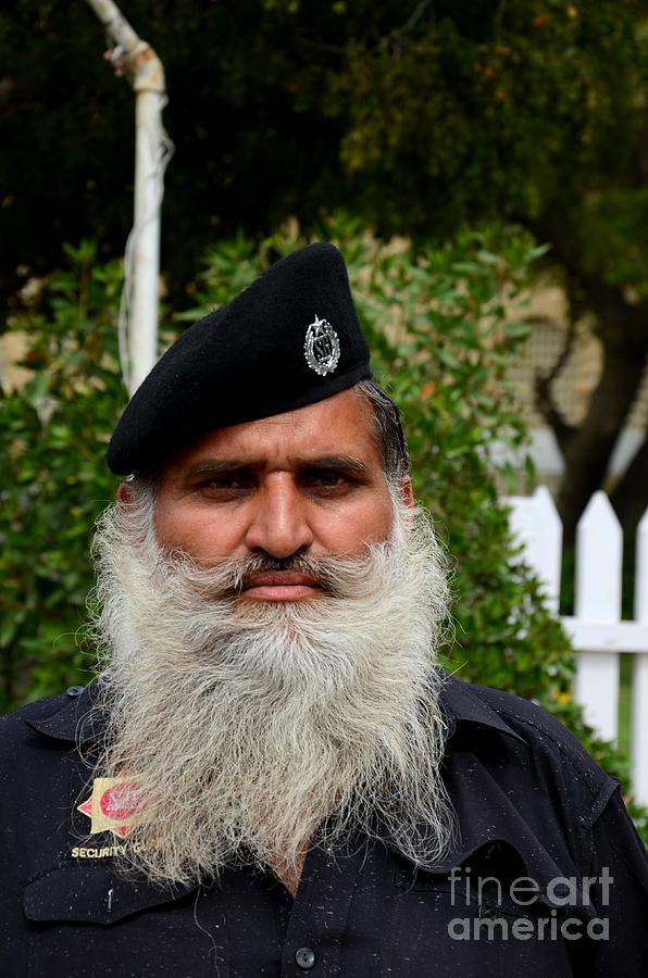 Portrait of Pakistani security guard with flowing white beard Karachi Pakistan Photograph by Imran Ahmed