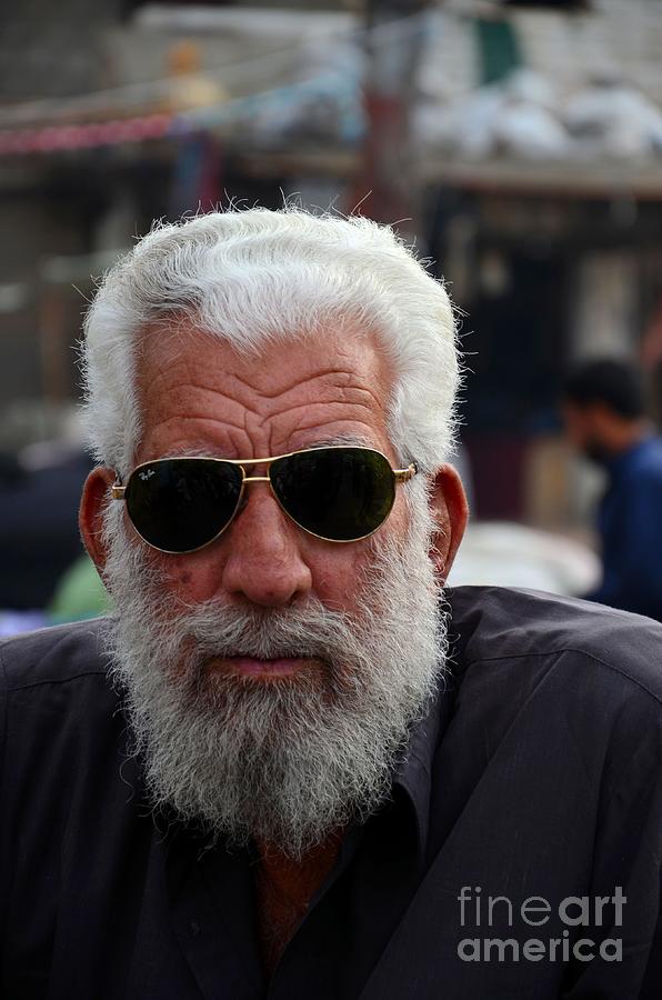 Portrait of Pakistani senior man in sunglasses Karachi Pakistan Photograph by Imran Ahmed
