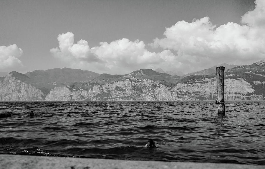 Post in Lake Garda Photograph by Ed James