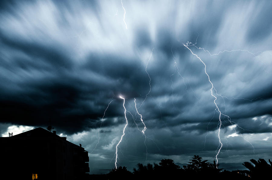 Powerful lightning Photograph by Wolfgang Stocker