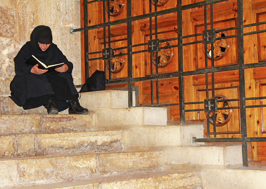 Praying at Holy Sepulchre Photograph by Munir Alawi