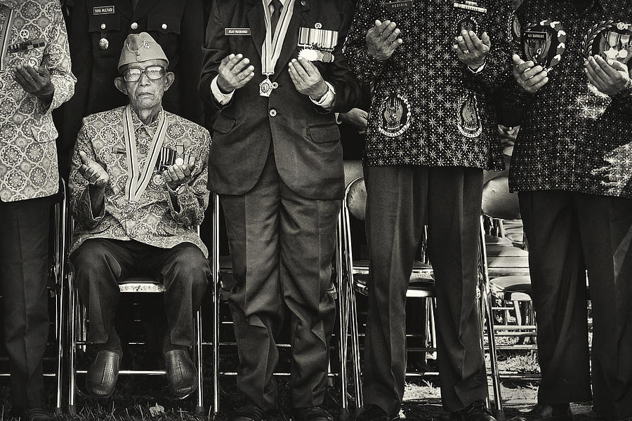 Black And White Photograph - Praying Veteran by Firman Maulana