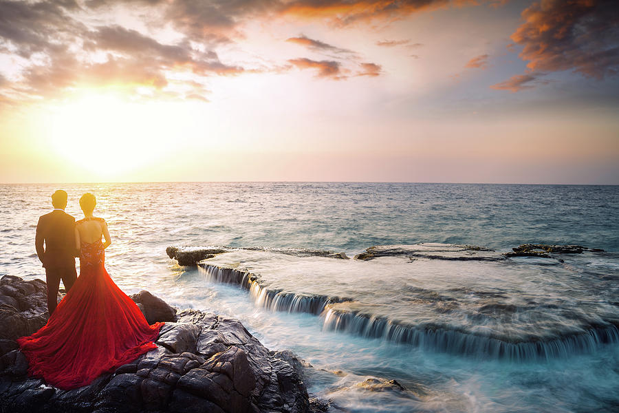 Pre wedding couple and Amazing landscape when the waves on a lar Photograph by Anek Suwannaphoom