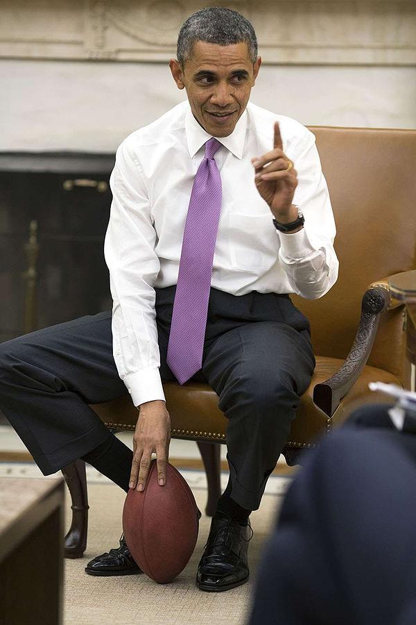 President Barack Obama Holds A Football Painting