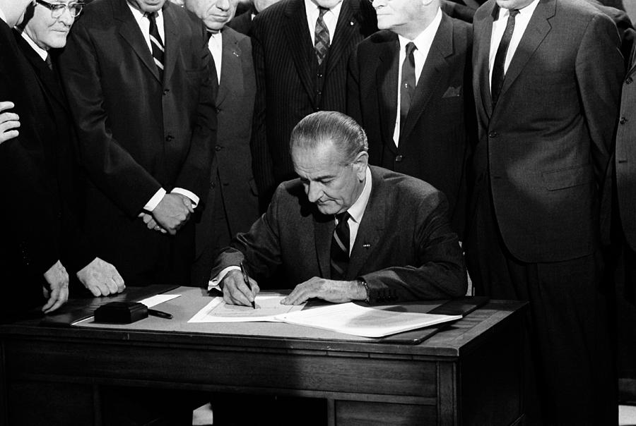 President Johnson Signing Civil Rights Bill - 1968 Photograph by War Is Hell Store