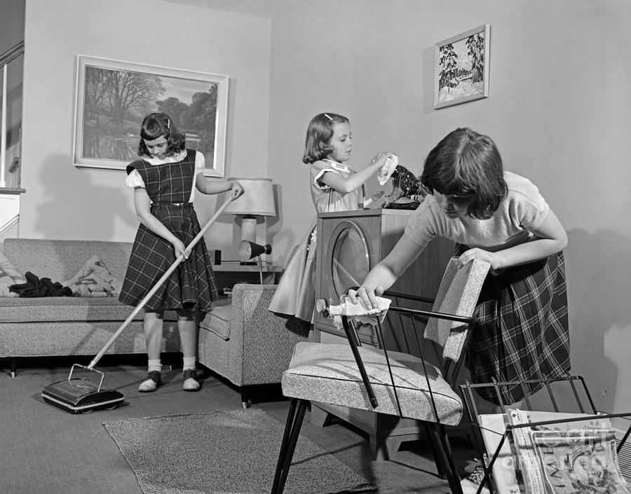 Vintage Photograph - Preteen Girls Cleaning Living Room by H. Armstrong Roberts/ClassicStock