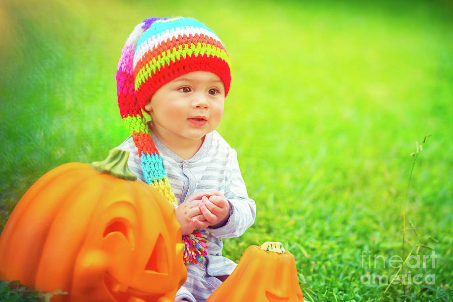 Pretty child with Halloween pumpkins Photograph by Anna Om