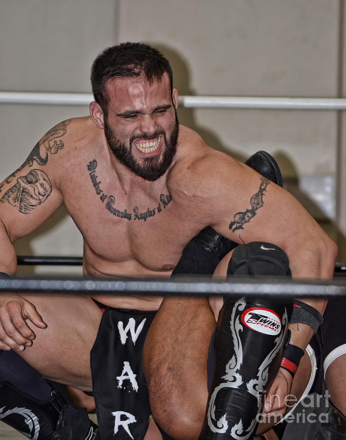 Pro Wrestler Joe Graves Applying Pressure to His Leg Lock Photograph by Jim Fitzpatrick