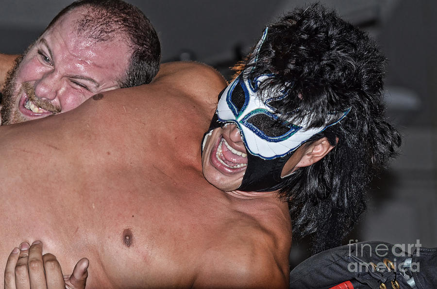 Pro Wrestler Kaka Meng Struggling to Escape From Dalton Frost Photograph by Jim Fitzpatrick