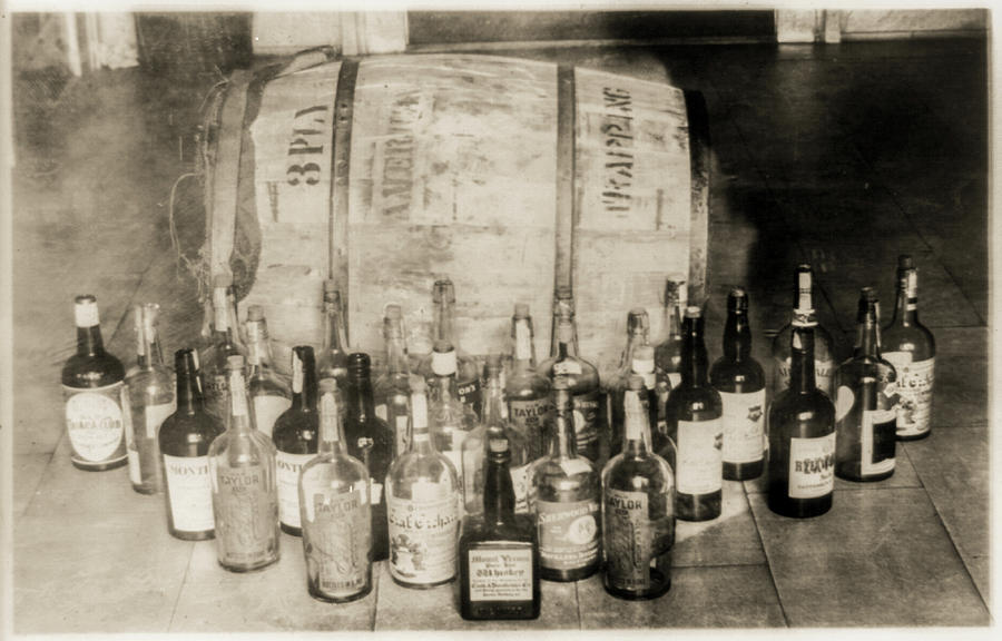 Prohibition Bottles and Barrel of Confiscated Whiskey Photograph by Digital Reproductions