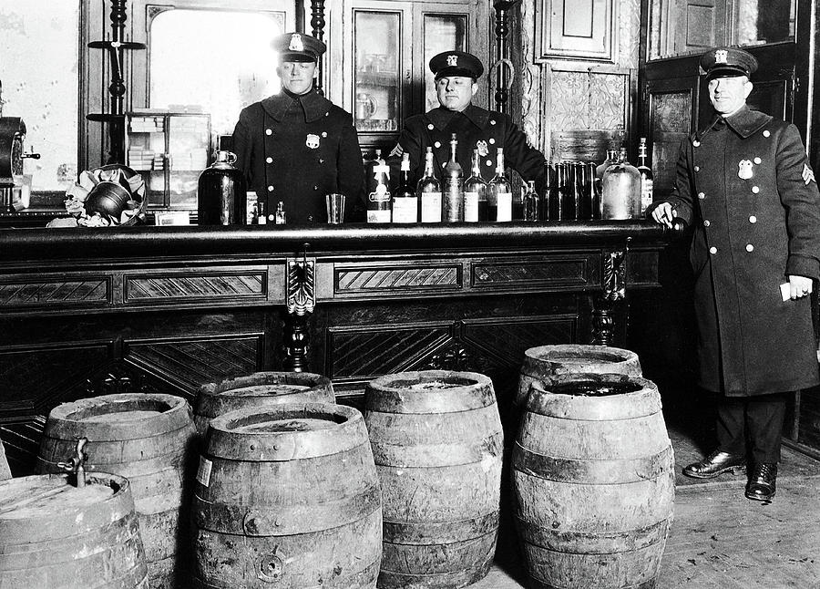 Prohibition - Cops Busting a Speakeasy Photograph by Bill Cannon