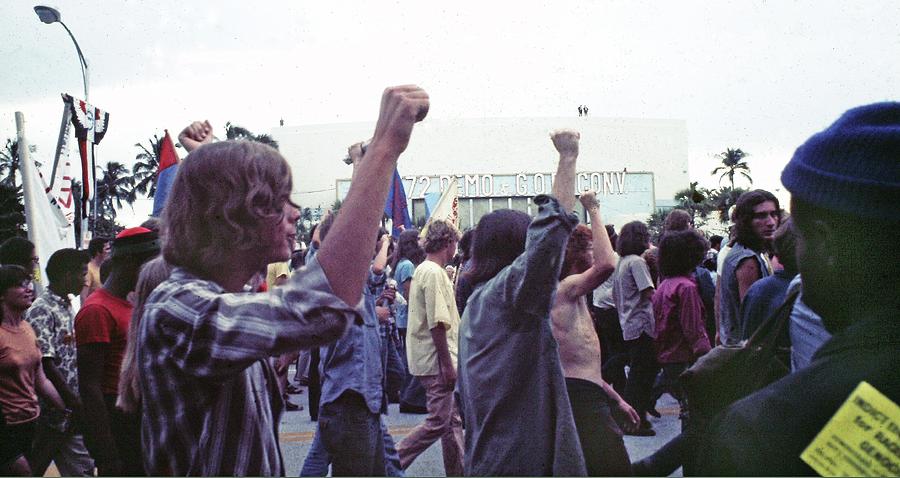 Protesters march in front of the convention hall Democratic Natl Convention Miami Beach Florida 1972 Photograph by David Lee Guss