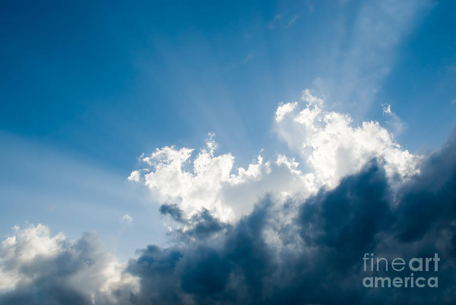 Nature Photograph - Puffy Clouds and Sunbeam Picture by Paul Velgos