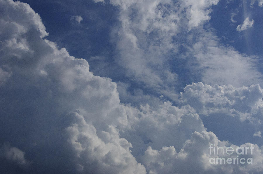 Puffy Clouds II Photograph by Debra Fedchin