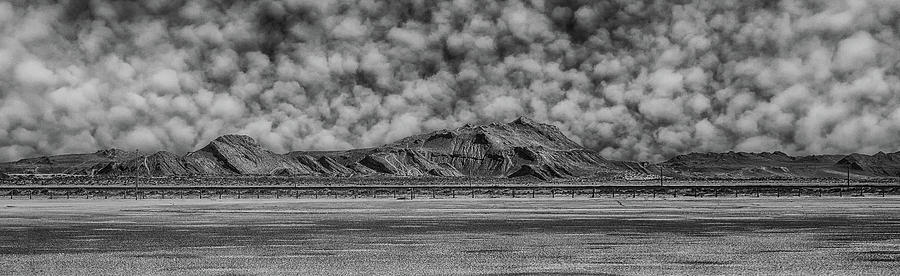 Puffy Clouds Over Desert Sand Hdr Bw Photograph