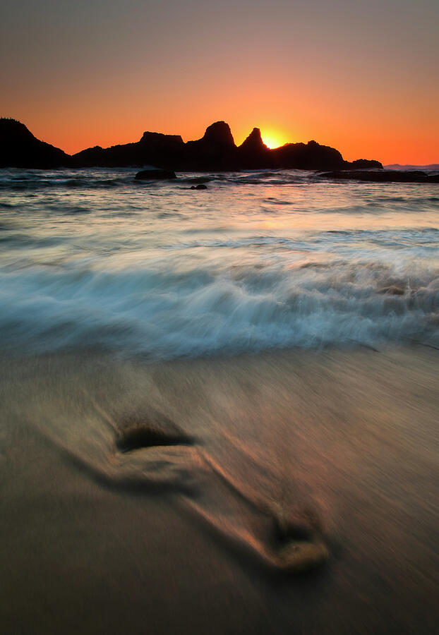Sunset Photograph - Pulled by the Tides by Michael Dawson