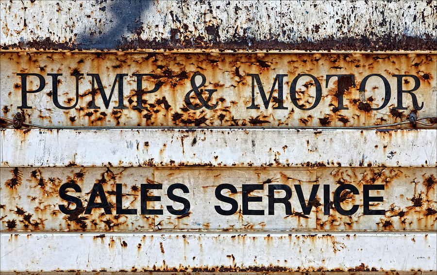 Sign Photograph - Pump and Motor Sales Sign by Robert Ullmann