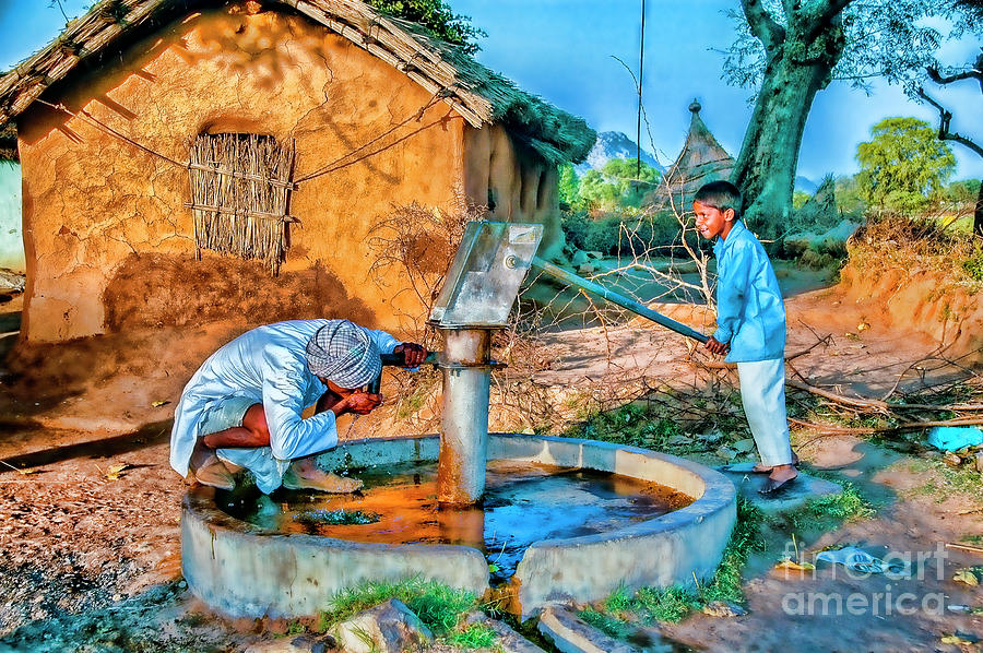 Pumping Water Photograph by Rick Bragan