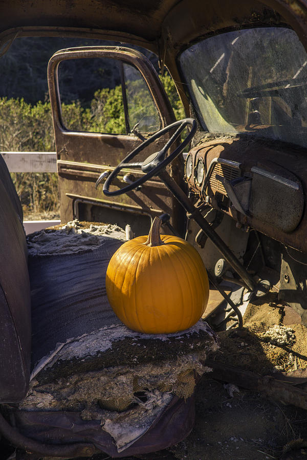 Punpkin On Old Truck Seat Photograph by Garry Gay