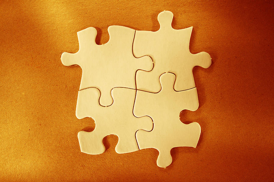 Puzzle pieces  Photograph by Les Cunliffe