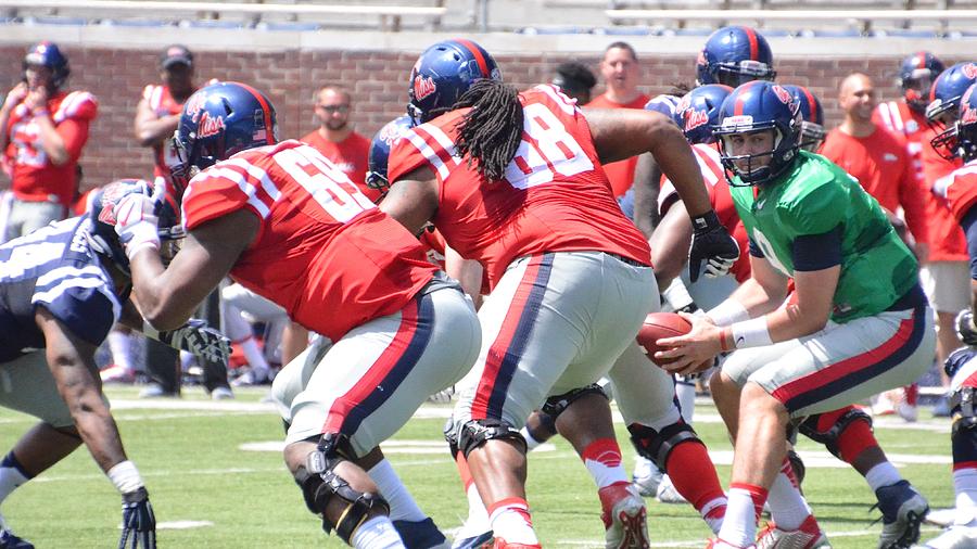 QB Handoff Photograph by Raymond Pickard - Fine Art America