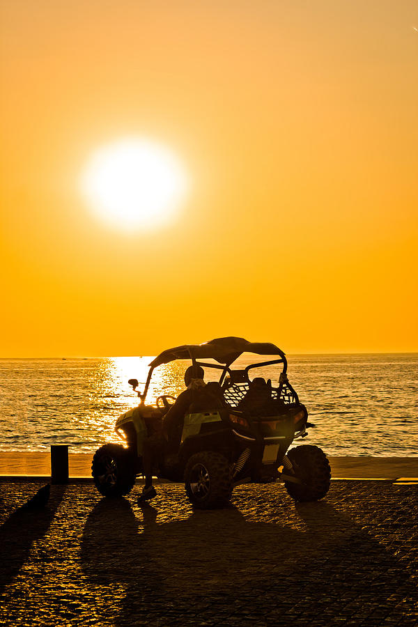 Quad motorbike by the sea at sunset Photograph by Brch Photography