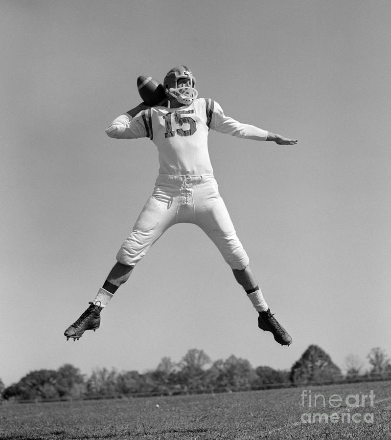 Football Photograph - Quarterback Throwing Pass, C.1960s by H. Armstrong Roberts/ClassicStock