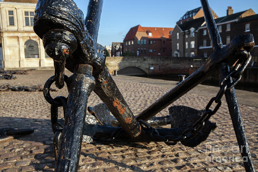Quay side anchor and chains in Norfolk Photograph by Simon Bratt
