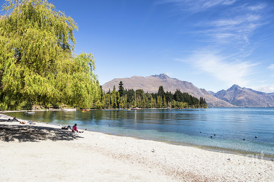 Queenstown beach on lake Wakatipu in New Zealand Photograph by Didier Marti