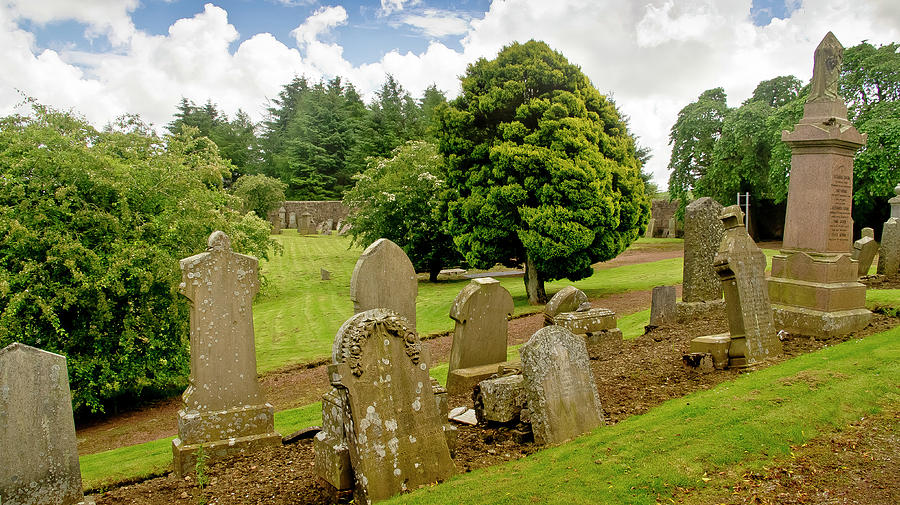 Quiet graveyard in summer day. Photograph by Elena Perelman