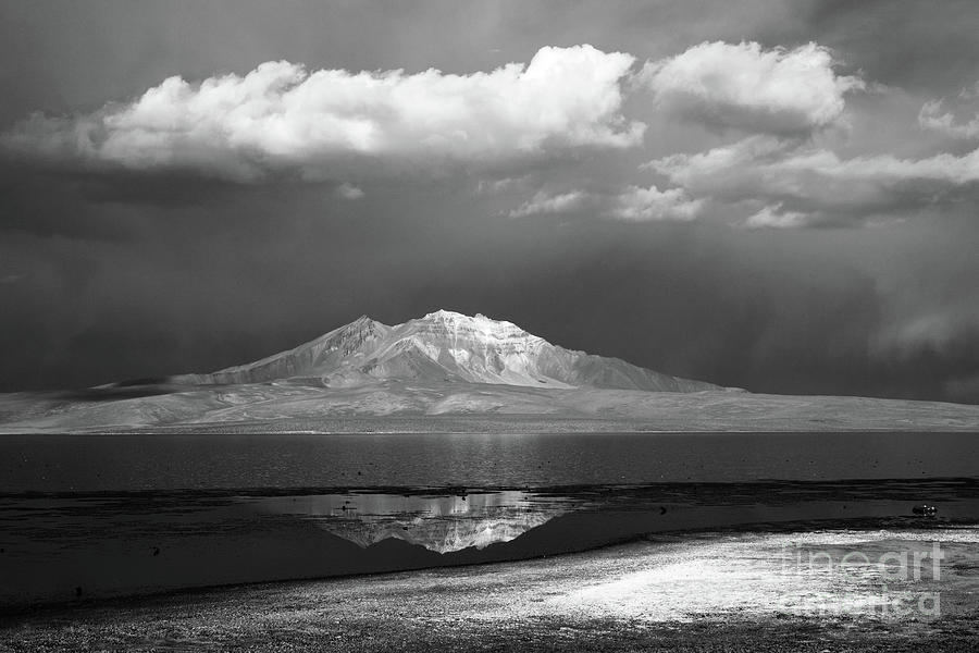Quisi Quisini volcano and Lake Chungara in Black and White Chile Photograph by James Brunker